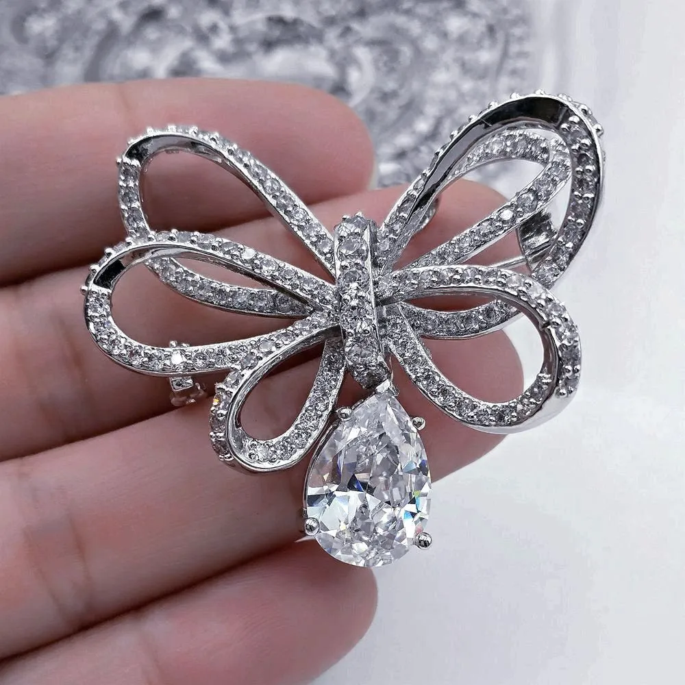 Classic Silver Tone Micro Pave CZ Triple Loop Ribbon Bow Brooches with Pear Drop