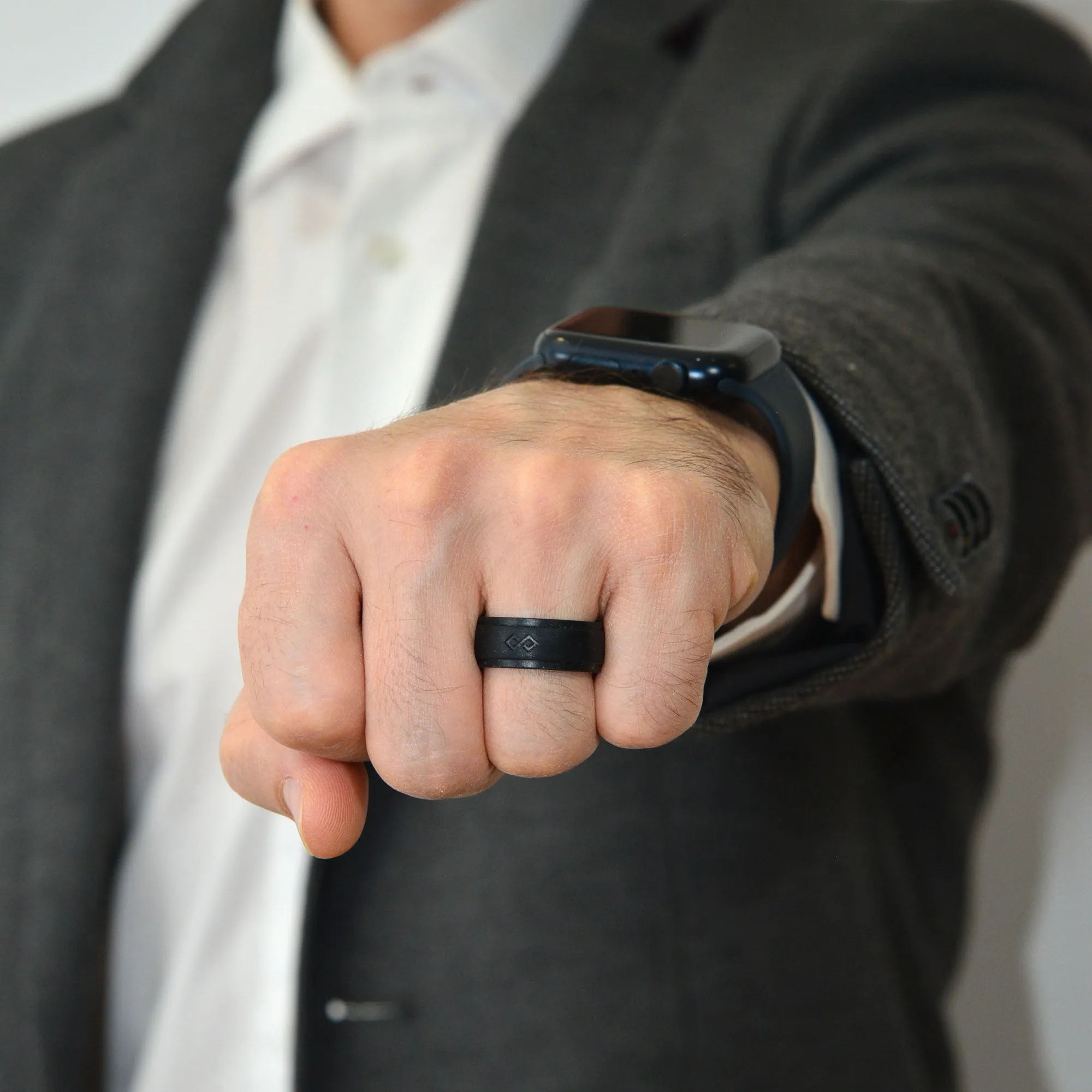 Set of Two Rings: Women's Nude Emerald & Men's Infinity Collection