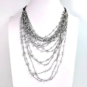 Waterfall mini pearl necklace on fine shiny thread